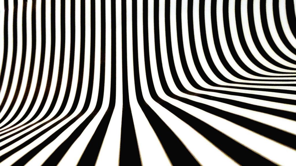 An optical illusion of black and white lines.