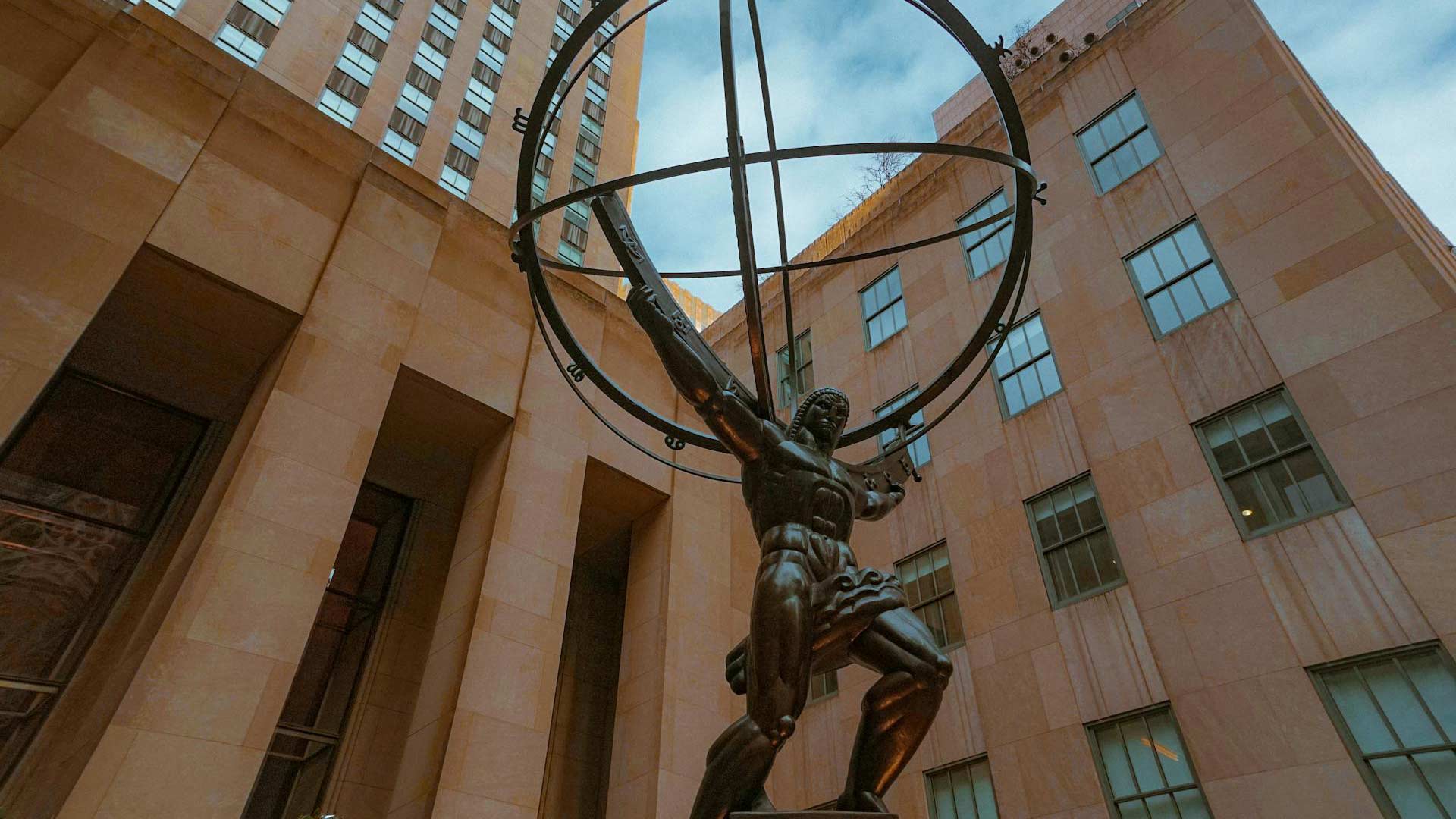 A statue of the Greek mythological Titan, Atlas, holding the Earth on his shoulders.