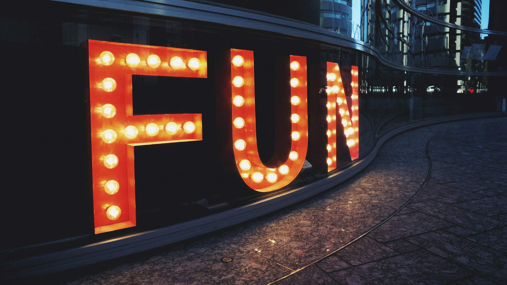Erickson-2025-03-07-1 “FUN” is spelled out in white lights against red backgrounds.