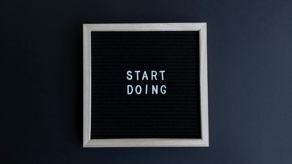 "Start doing" is written on a letterboard.